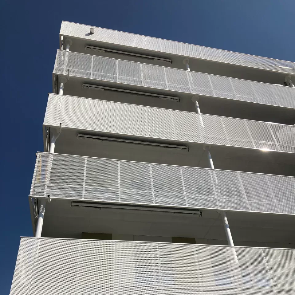 Expanded metal balcony infills