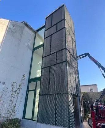 Expanded metal in a frame as a lift enclosure – project in Denmark